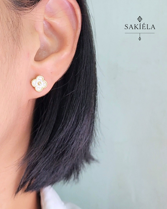 Van Cleef & Arpels' Alhambra Earrings (Yellow Gold)