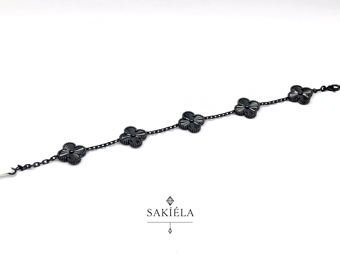 Van Cleef & Arpels' Alhambra 5 Motif Black Gold Bracelet
