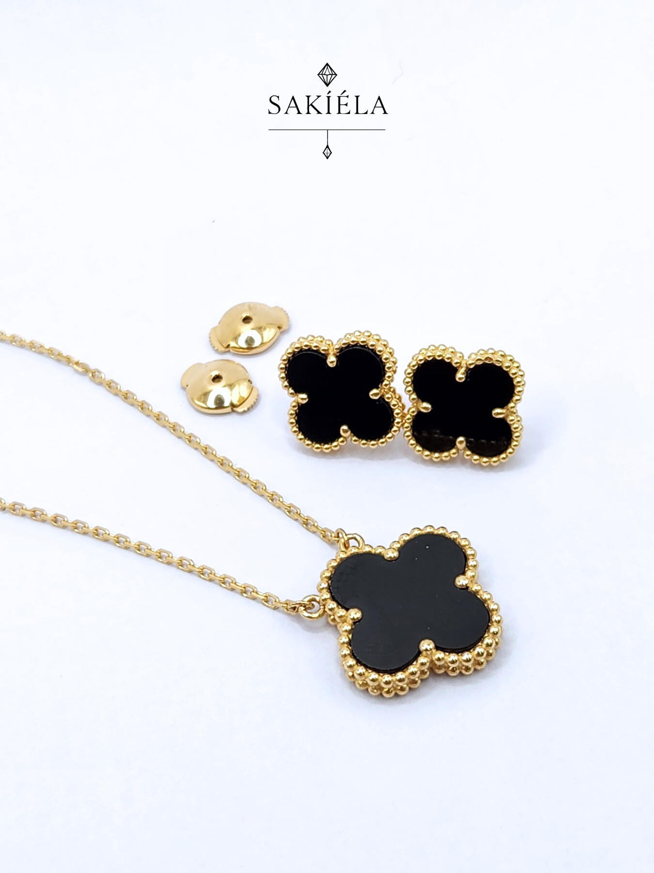 Van Cleef & Arpels' Alhambra 1 Motif Necklace and Earrings (Onyx Inlay)