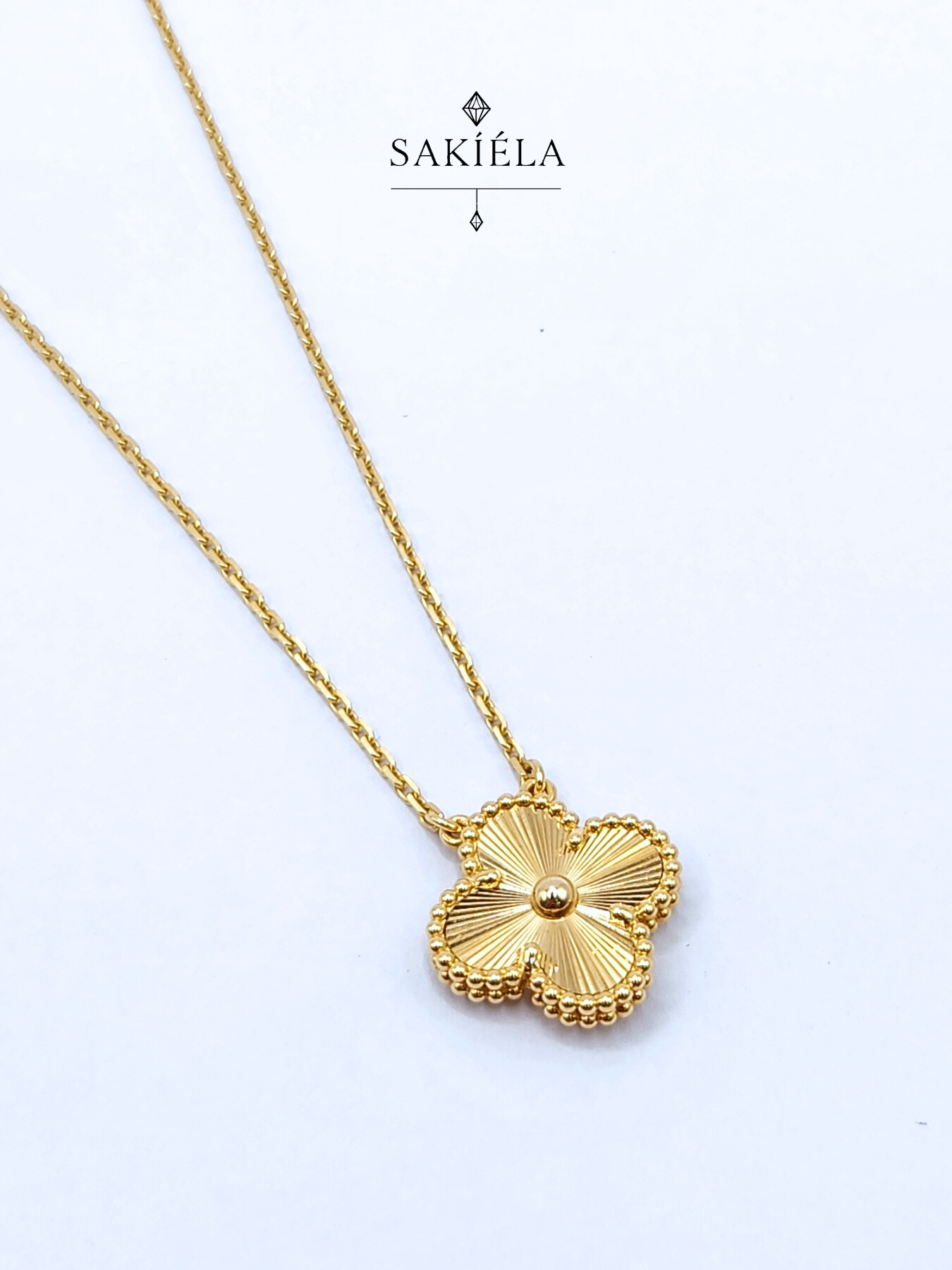 Van Cleef & Arpels' Alhambra 1 Motif Necklace and Earrings