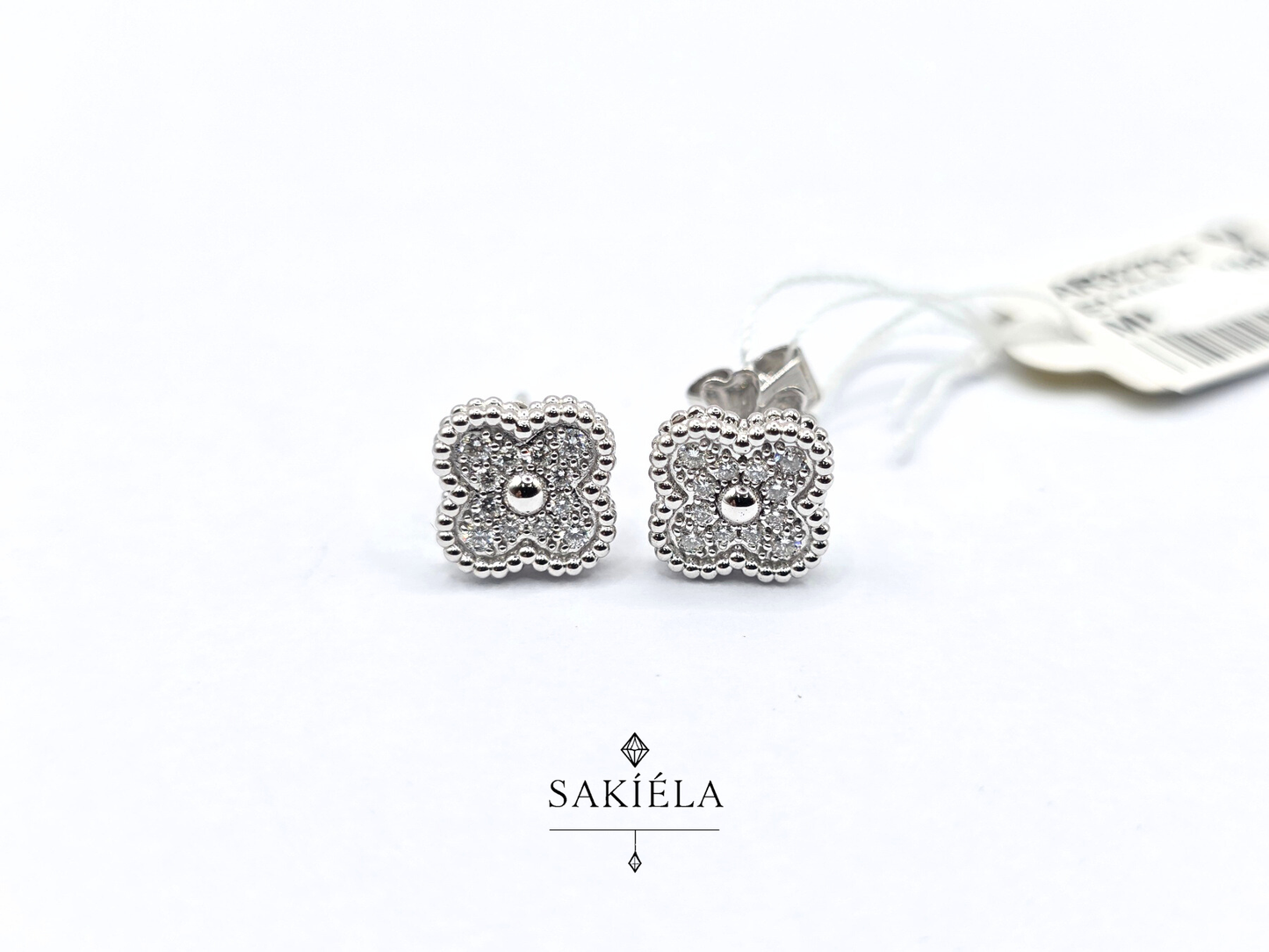 Van Cleef & Arpels' Alhambra Earrings (White Gold)