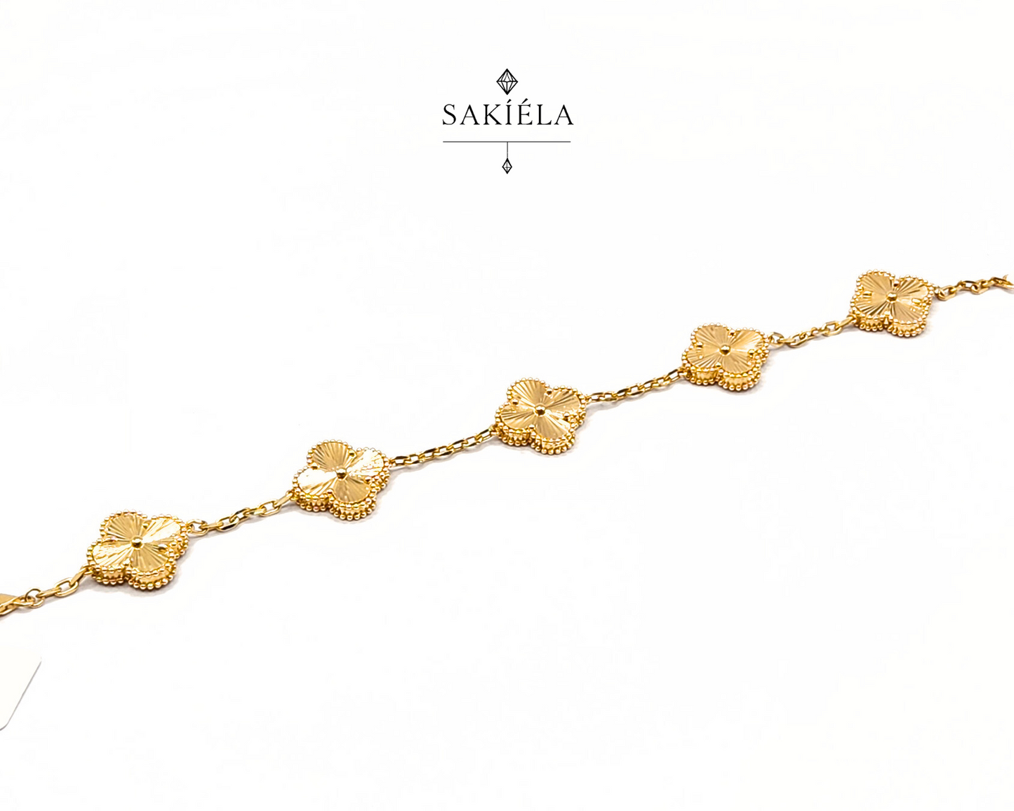 Van Cleef & Arpels' Alhambra 5 Motif Guilloché Bracelet